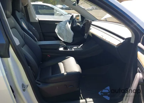 2023 Tesla Model Y Awd/Long Range Dual Motor All-Wheel Drive z USA, uszkodzony, nr VIN 7SAYGDEE7PA096439